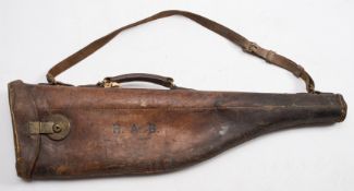 An early 20th century leather leg o' mutton gun case: initialed HAB' together with a leather gun