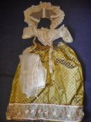 A Regency period olive green and floral embroidered silk skirt,