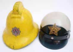A late 20th century Devon Fire and Rescue Cromwell pattern helmet by Helmets Ltd: together with an