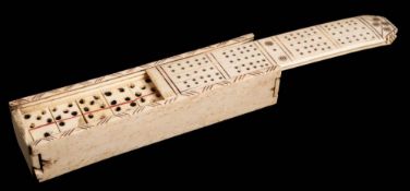 A 19th century Prisoner of War bone dominoes and cribbage set:,