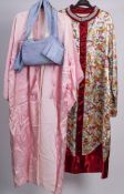 A mid -20th century printed silk kimono: together with a pink silk kimono and with blue silk obi.
