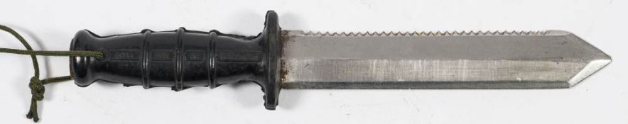 A British Naval Service NATO pattern magnetic diver's knife: the double edge blade with saw backed