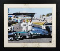 Lewis Hamilton and Nico Rosberg photo signed Mercedes poster: framed and glazed,