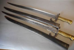 A French 1866 pattern Chassepot bayonet: with 57cm fullered yataghan blade, and ribbed brass grip,