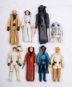 A group of vintage Star Wars figures: 'Darth Vader', ' 'Luke Skywalker', 'Obi Wan Kenobi,