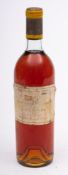 A Bottle of Chateau d'Yquem Lur-Saluces 1965: low neck.