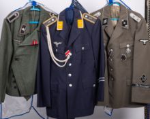 A group of seven reproduction German military unifoms: