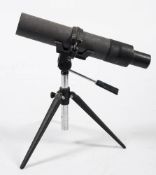A Greenkat 22x57mm Spotting Scope: on tripod.