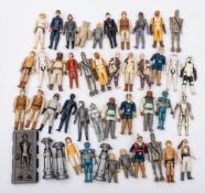 A collection of various vintage Star Wars figures: including AT-AT Driver,