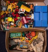Britains and others. An unboxed collection of various agricultural and construction vehicles.