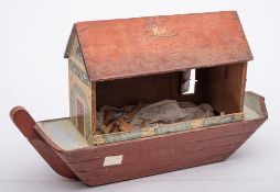 A late 19th century painted pine Noah's Ark: red painted roof with dove to one side,
