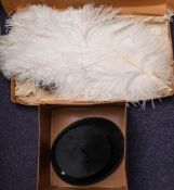 An early 20th century white ostrich feather fan with bone sticks: together with a black felt top