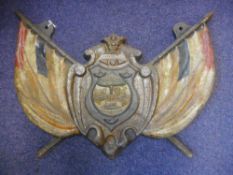 A large cast iron Coat of Arms for The Orange Free State: the central shield with motto Vryheid