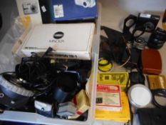 A collection of assorted digital cameras,: camera accessories including light meters, flash guns,