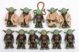 A group of vintage Star Wars figures comprising eleven 'Yoda' figures:
