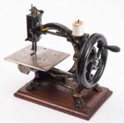 A Smith & Co 'The Monarch' sewing machine: with C-shaped frame,