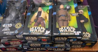 Kenner and others. A boxed group of 12 inch Star Wars figure: including Grand Moff Tarkin.