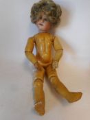 An Armand Marseille bisque head doll: impressed Armand Marseille. 390n. D.R.G.M.246/7. A. 1/2 M.