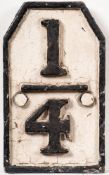 A cast iron quarter mile marker sign: raised numbers with border in a hexagonal,