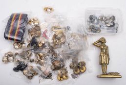 A collection of various military buttons: various regiments together with a Royal Engineers stable