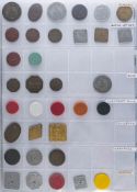 An album of seventeen sheets of co-operative society tokens: