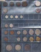 A miscellaneous collection of coins and tokens including Irish and Australian 19th century