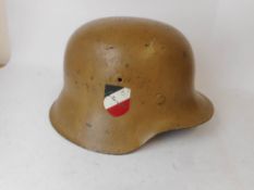 A German post World War II M42 steel helmet: stamped EFCS 2076? with leather liner.