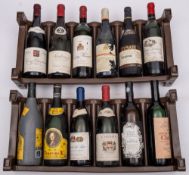A bottle of Chateau Lator Bordeaux Superieur 1979 and eleven other various bottles.