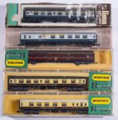 Three Minitrix N gauge passenger coaches: together with a Hornby Minitrix BR passenger coach and a