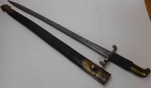 An 1855 Lancaster sword bayonet by Swinburn and Son: with 61cm single edged blade,