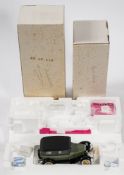 A Franklin Mint 1/24th scale model of a 1907 Rolls Royce Silver Ghost: together with a 1030 Ford
