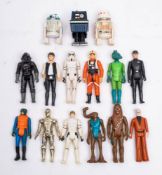 A group of vintage Star Wars figures.