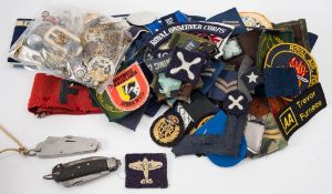 A collection of various cap and shoulder badges: various regiments also a WWII Civil Defence 'Fire'