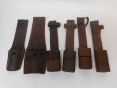 Six various assorted leather frogs:.