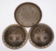 Two Indo-Persian steel dhals: of circular outline with inlaid niello enamel decoration and four