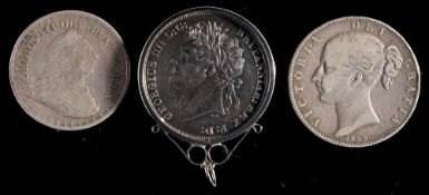 An 1821 crown with silver mount: an 1811 three shilling token and an 1845 crown (3)