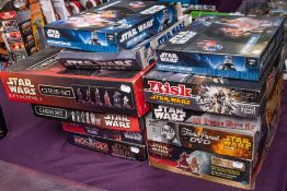 A collection of various Star Wars board games.