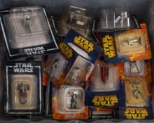 De Agostini Star Wars. A boxed group of vehicles and action figures.