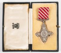 A reproduction Air Force Cross: in case.