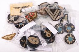 A collection of various German military cloth badges including: aircraft equipment administration