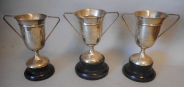 Three silver twin handled trophy cups, maker Charles Boyton & Son Ltd, London,