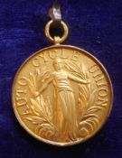 A 9ct gold medal for Auto Cycle Union: The Six Days Standard Stock Trial, awarded to H, M. Hicks, 5.