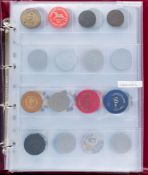 An album containing entertainment tokens and casino poker chips: