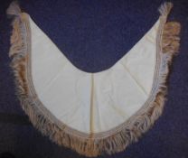 A Regency period duck egg blue silk cape: of triangular outline with fringed border.
