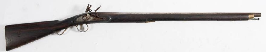 A 19th century smooth bore flintlock musket by Tower, London,