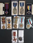 A group of Masonic jewels,: including a silver and enamel RMIG breast badge,