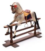 A late 19th / early 20th century rocking horse attributed to G and J Lines Brothers London,