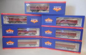 Bachmann, seven assorted BR crimson passenger coaches: all weathered, all boxed.