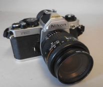 A Nikon FM2 35mm SLR camera: fitted with a Nikon AF Nikkor 35-70mm 1:3.3-4.5 lens.