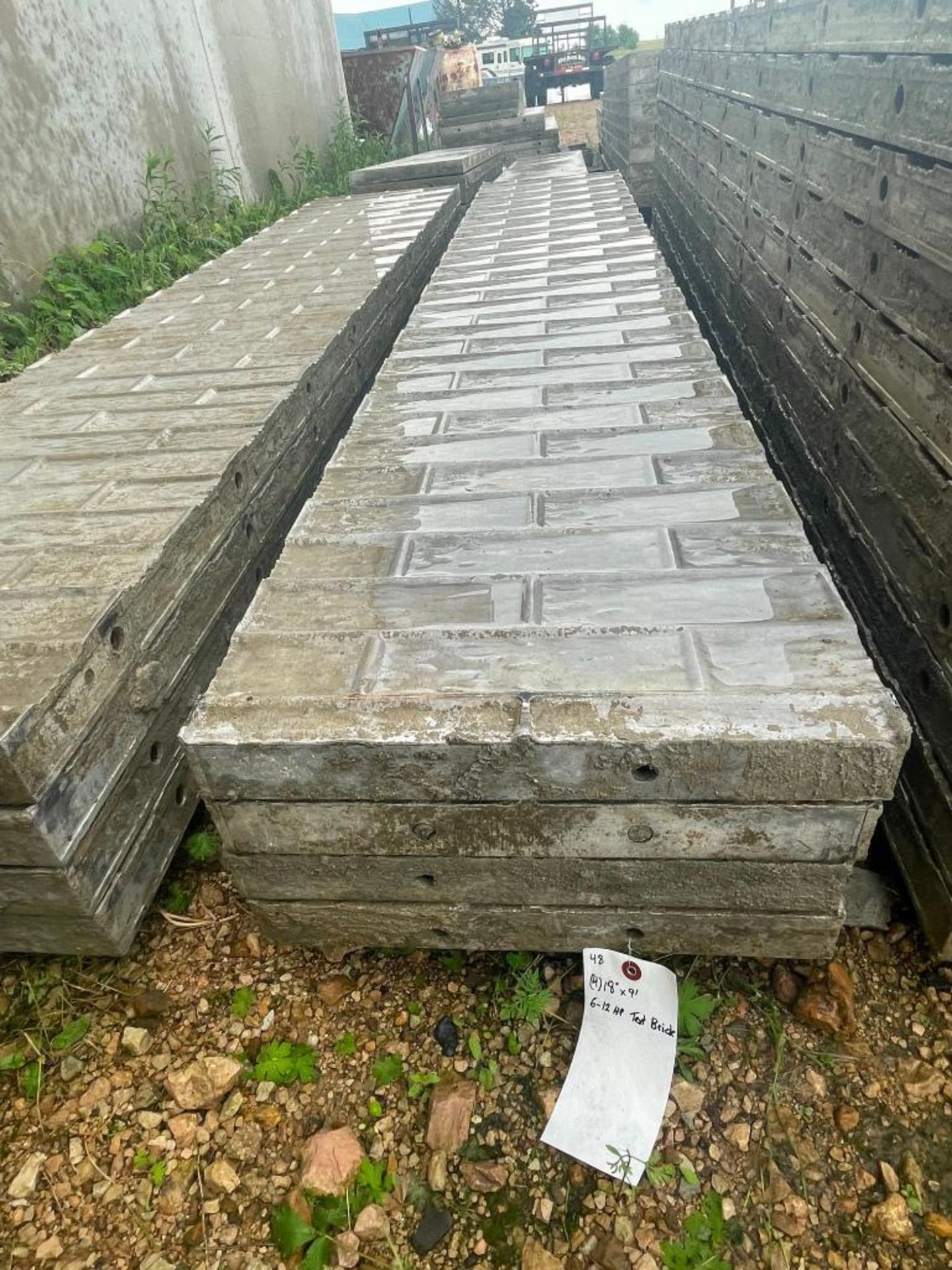 (4) 18" x 9' Wall-Ties Textured Brick Aluminum Concrete Forms 6-12 Hole Pattern. Located in Lake Cry